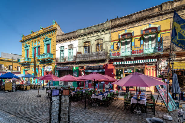 Restaurants in colorful neighborhood La Boca - Buenos Aires, Argentina Buenos Aires, Argentina - May 12, 2018: Restaurants in colorful neighborhood La Boca - Buenos Aires, Argentina caminito stock pictures, royalty-free photos & images