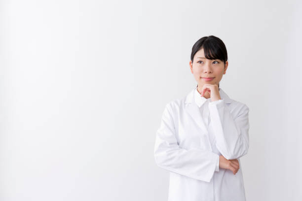 istock A woman in a white suit 976812448