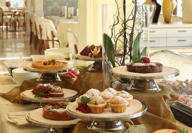istock hotel breakfast with cakes and muffins 976850552