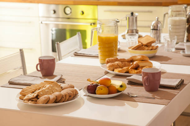nice home breackfast with juice, coffee, croissants,fresh fruit and biscuits.jpg nice home breackfast with juice, coffee, croissants,fresh fruit and biscuits.jpg crostata photos stock pictures, royalty-free photos & images