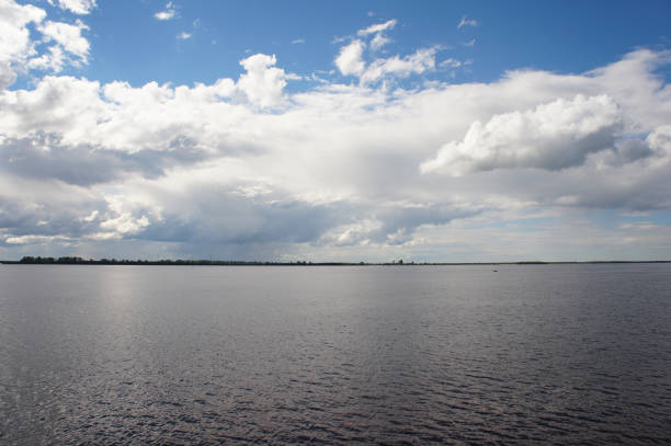 istock River landscape water ripples with cloudy sky 976851540
