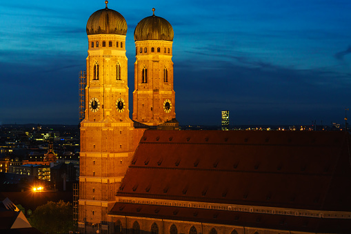 Aerial view of Cathedral of Our Dear Lady or Frauenkirche at night, Munich city, Bavaria, Germany