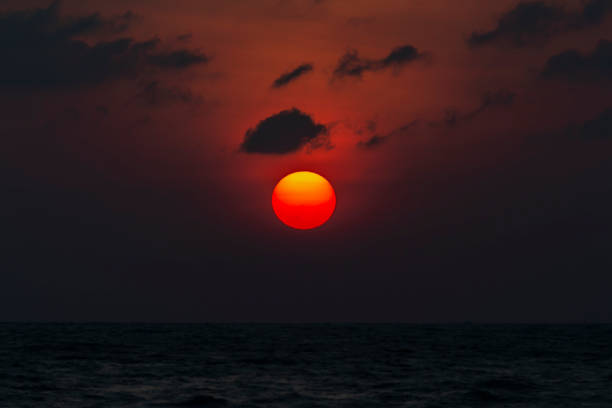 istock Set Big sun red orange and black clouds 976858610