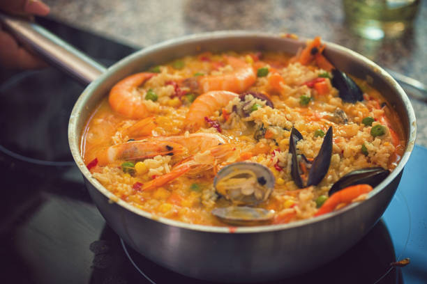 istock Preparing Spanish Seafood Paella 976859150