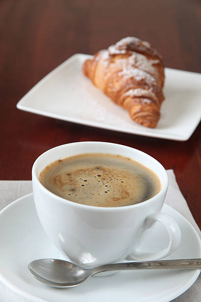 istock Coffee and croissant 97687296