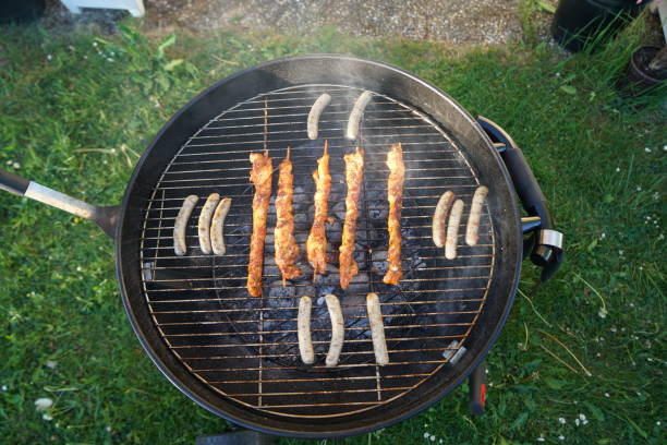 istock Sausages barbecue with a charcoal 976894810