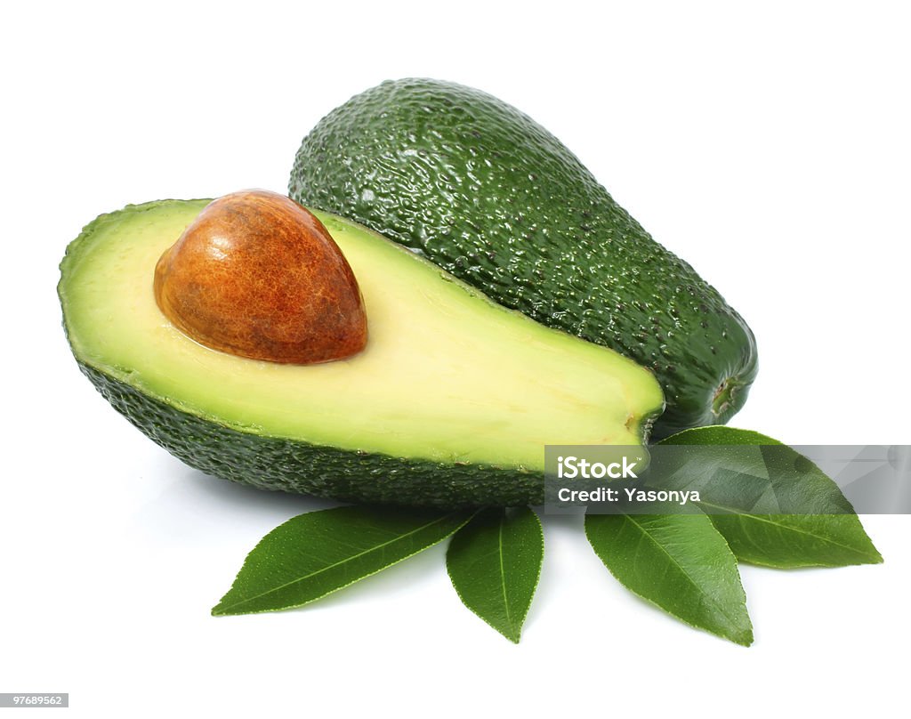fresh green avocado fruits with leaf isolated on white  Avocado Stock Photo