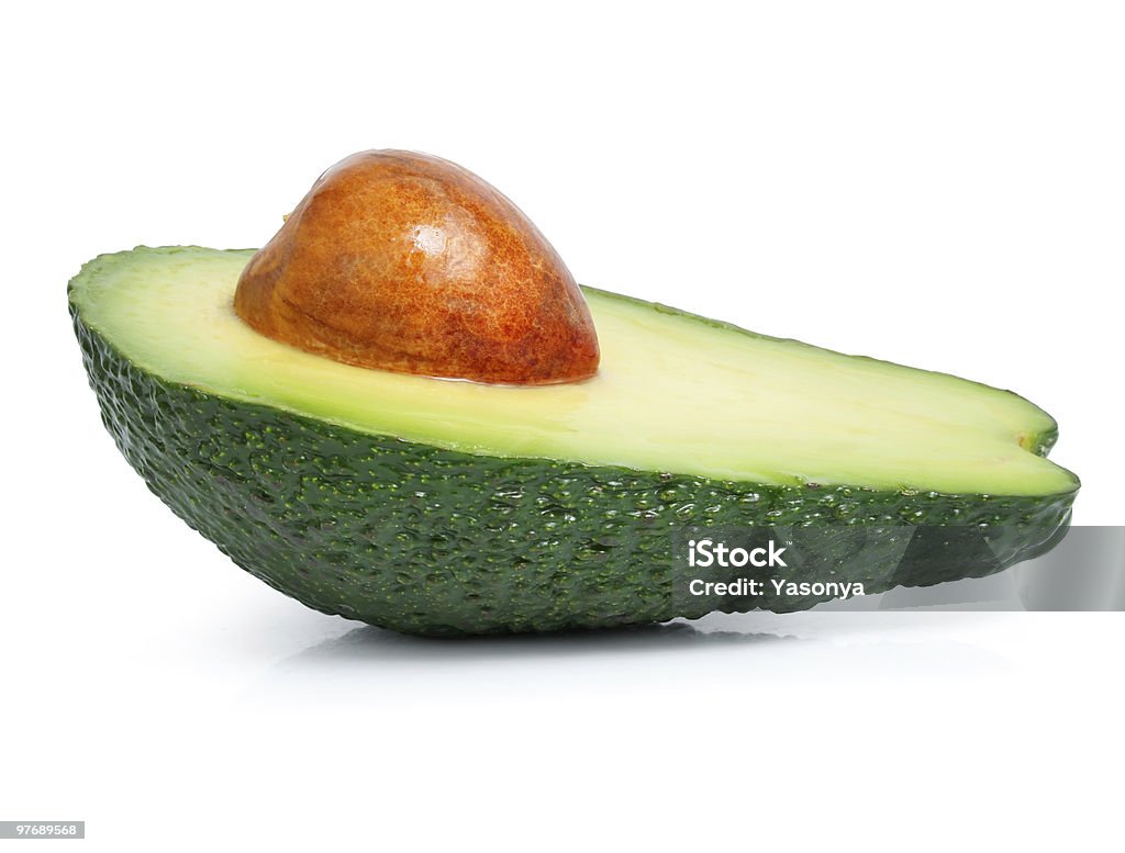 fresh green avocado fruit cut isolated on white  Avocado Stock Photo