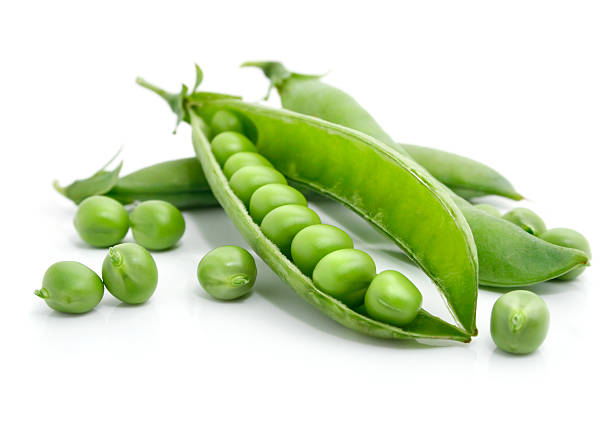 istock fresh green pea in the pod isolated 97689694
