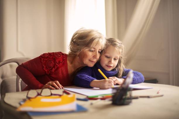 istock Coloring with grandma 976911390