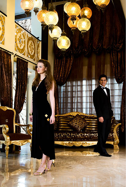istock man looking to elegant woman 97691277