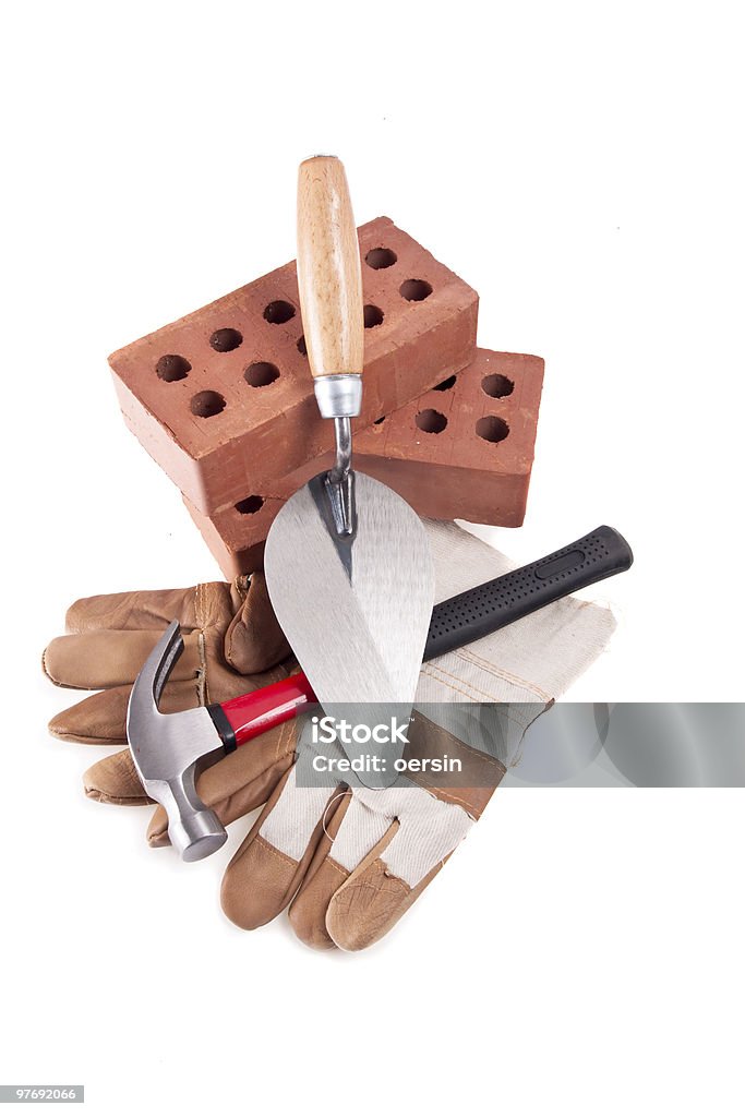 Hammer, Glove, Brick and trowel  Brick Stock Photo