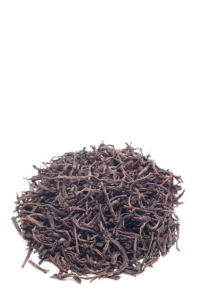 istock pile of black tea on white 97692245