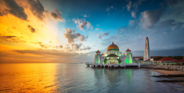 istock Clear reflections during sunrise at Straits Mosque, Malacca. Nature composition. 976933066