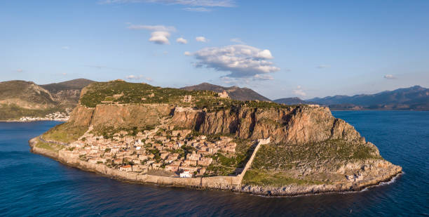 Aerial view of the ancient hillside town of Monemvasia located in the southeastern part of the Peloponnese peninsula Aerial view of the ancient hillside town of Monemvasia located in the southeastern part of the Peloponnese peninsula, Greece monemvasia stock pictures, royalty-free photos & images