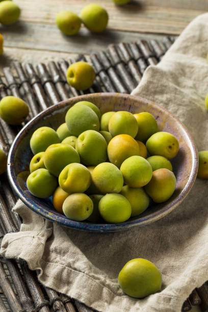 istock Raw Green Organic Ume Fruit 976943384
