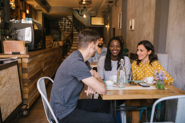 istock Friends talking at the coffee shop 976966596