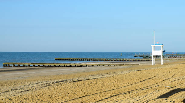 istock Beach guard tower on the sandy beach 976979022