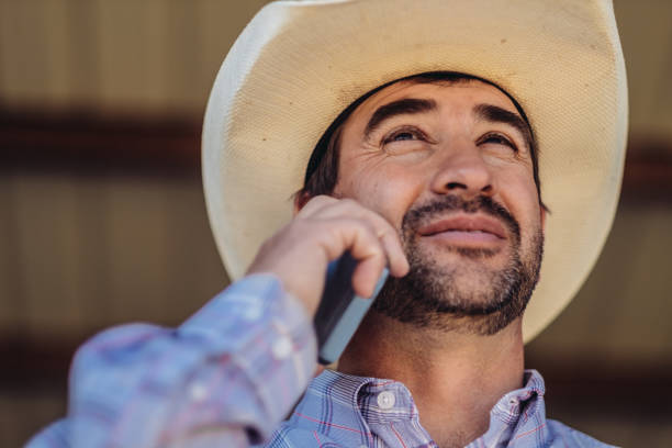 istock Utah  cowboy with mobile phone 976991216