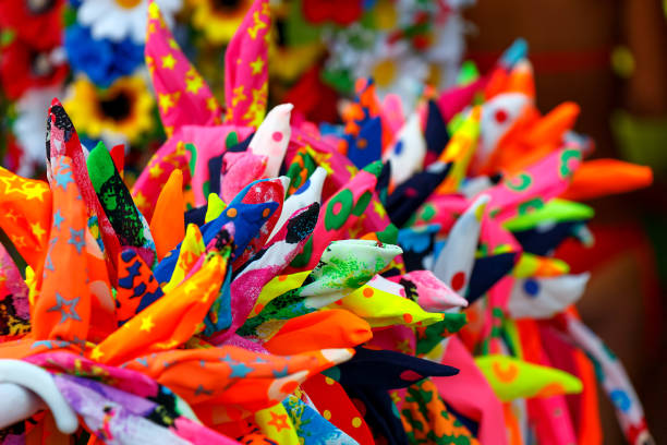 Multicolored bright pieces of fabric as background closeup