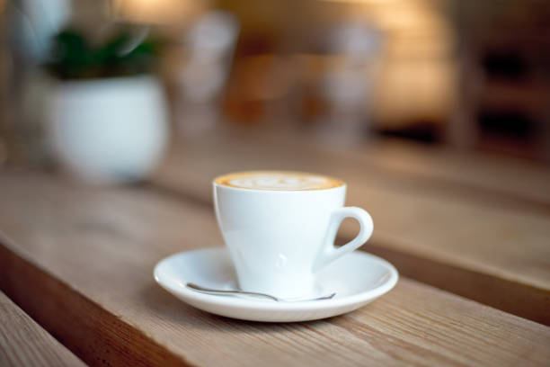 istock cup of coffee on wooden table 977018614