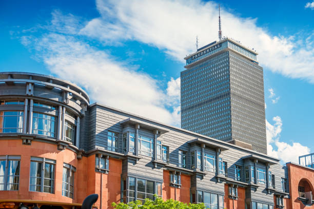 Townhouses and the Prudential Tower in Back Bay Boston Massachusetts Townhouses and the Prudential Tower in Back Bay Boston Massachusetts, USA on a sunny day. boston prudential building stock pictures, royalty-free photos & images