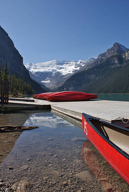 istock Canoes at lake Louise 97709834