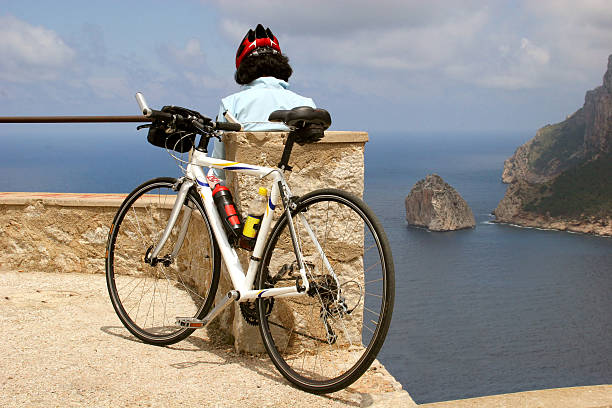 Biker siesta at Cabo Formentor, Mallorca, Spain stock photo