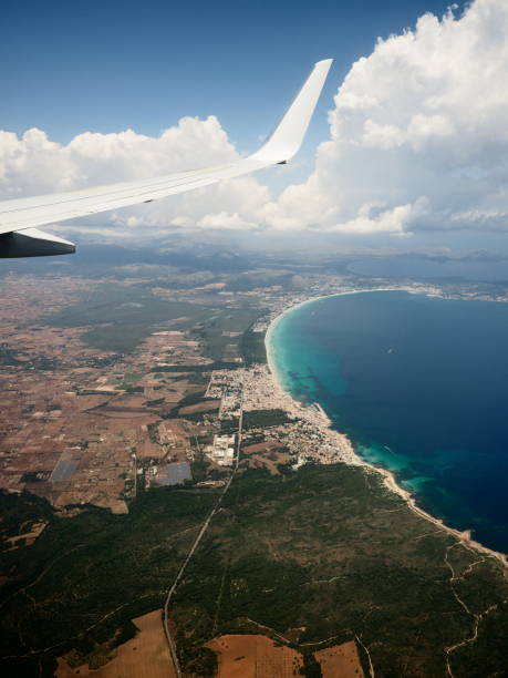 istock Wing of airplane from window 977124214