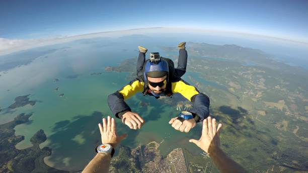 Skydiver point of view above the beach