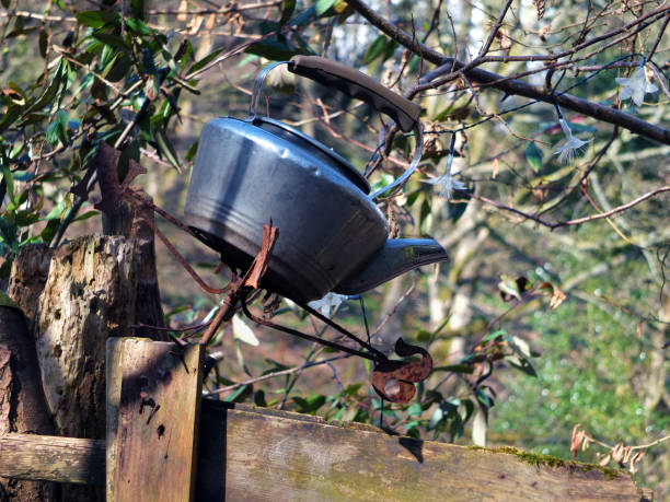 istock old discarded kettle on top of a gate post in a rural setting 977152850