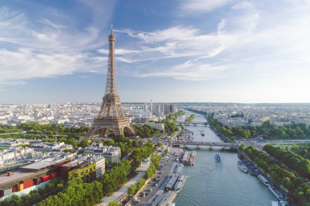 Aerial view of Paris with Eiffel tower during sunset Aerial view of Paris with Eiffel tower during sunset paris photos stock pictures, royalty-free photos & images