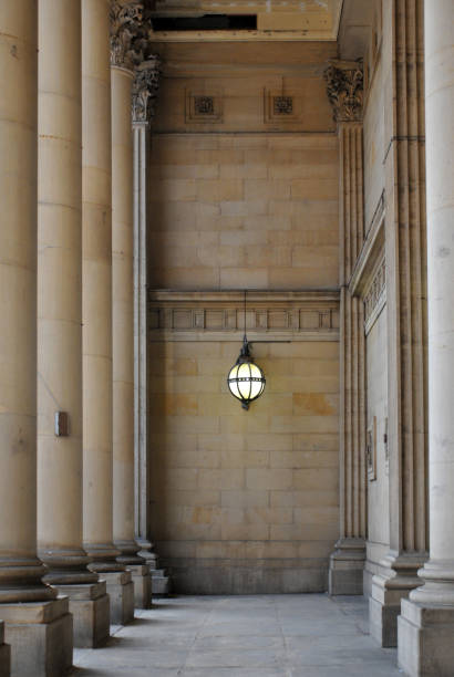 istock stone columns ofleeds town hall entrace with stone pillars and Victorian lamp 977178038