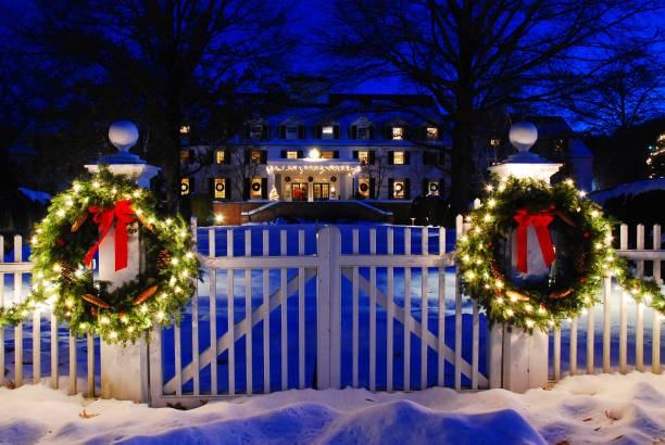 Christmas in the country Woodstock, VT, USA December 12, 2009 Christmas wreathes and lights decorate a country inn in Woodstock, Vermont woodstock stock pictures, royalty-free photos & images