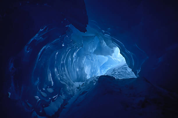 Blue ice cave stock photo