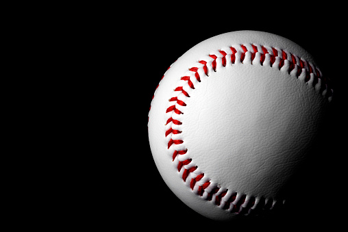 Baseball ball on a grass background. 3d illustration.