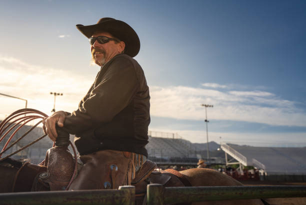 istock Cowboy at rodeo arena 977252400