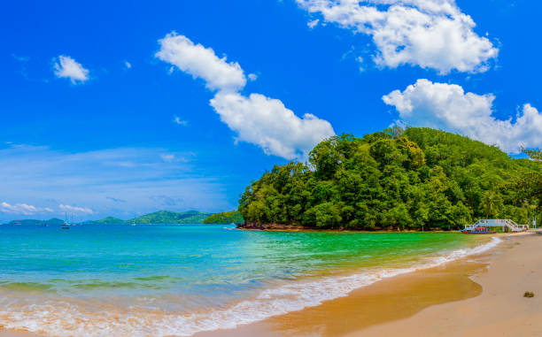 istock a long tail boat parking near the bridge at Ao Yon beach 977264252