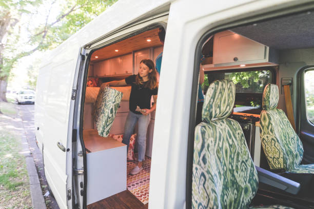 istock Millennial couple living in a van 977272896