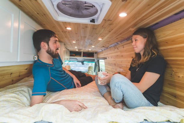 istock Millennial couple living in a van 977272898