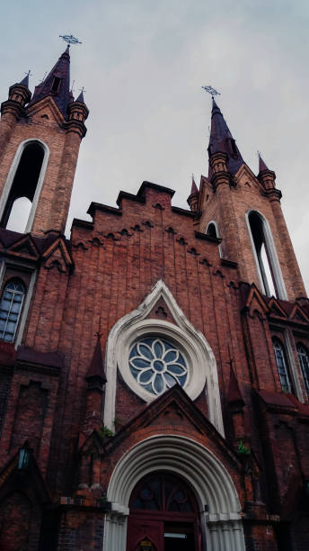 istock Facade of an abandoned old bricks church 977280138