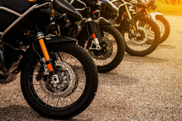 istock Row Of Motorcycles On Street 977297206