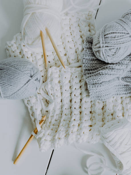 istock High Angle View Of Woolen Knitted Sweater On Table 977304404