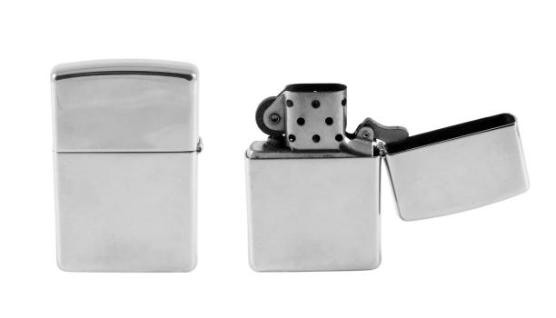 istock Close-Up Of Cigarette Lighter Over White Background 977307360