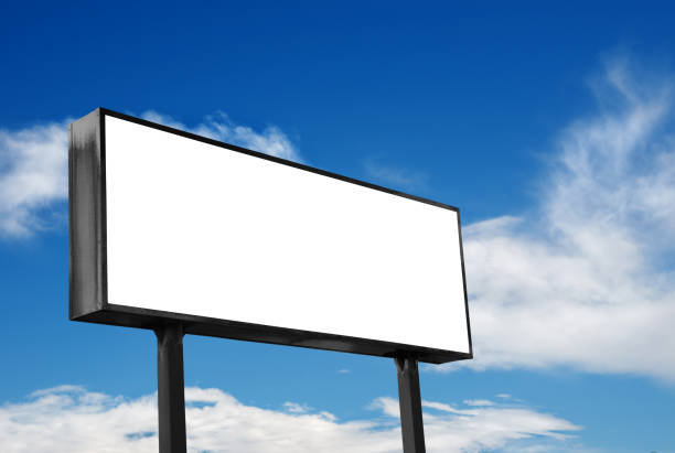 istock Low Angle View Of Billboard Against Sky 977307592