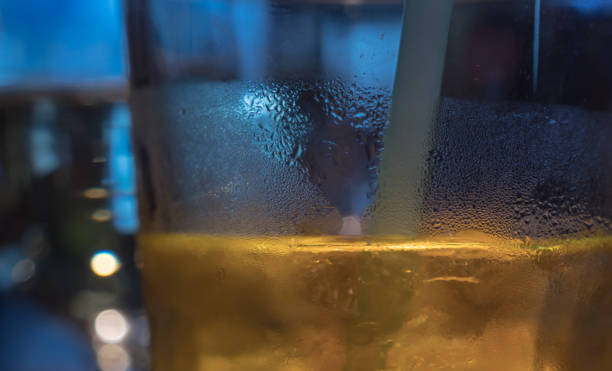 istock Close-up image of drops on glass surface 977308180