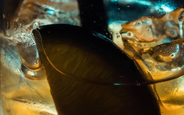 istock Close-up image of lemon and ice cubes in glass 977308270