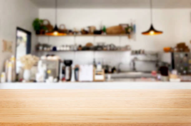 istock Close-Up Of Wooden Table Against Kitchen 977308438