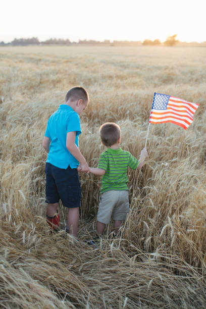 istock Brothers in the wheat field 977311196