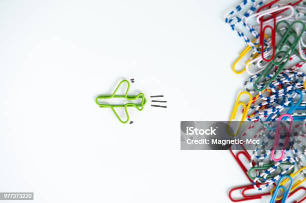 Business Concept For Group Of Stacked Paperclip With Another One Green Plane Paperclip Is Point To Another Direction As A Team Leadership Stock Photo - Download Image Now
